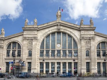 "The facade of the railway station Gard du Nord in Paris, France. Multiple exposure."